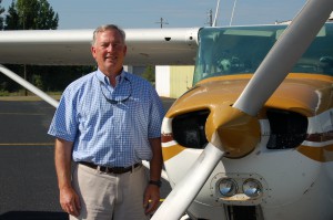 Eddie beside his plane.